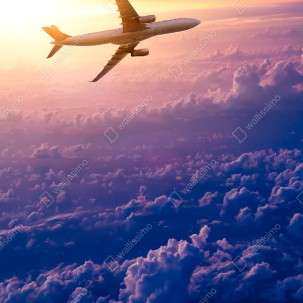 Repositionierbarer Aufkleber flugzeug über den wolken bei sonnenaufgang – Wallnifity® Repositionierbarer Aufkleber flugzeug über den wolken bei sonnenaufgang – Wallnifity®
