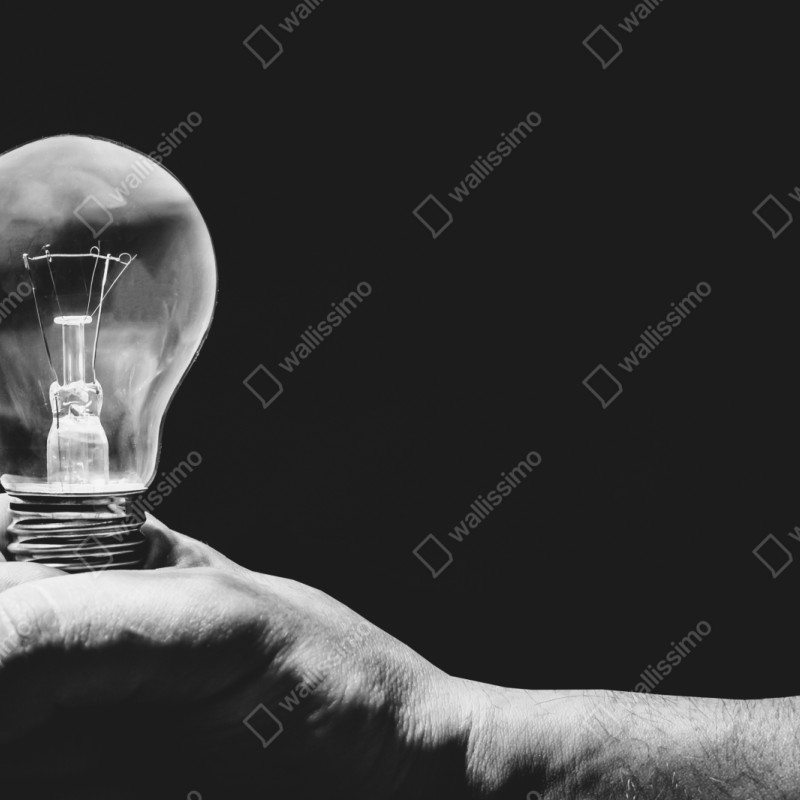 Repositionierbarer Aufkleber monochrome hand hält glühbirne – Wallnifity® Repositionierbarer Aufkleber monochrome hand hält glühbirne – Wallnifity®