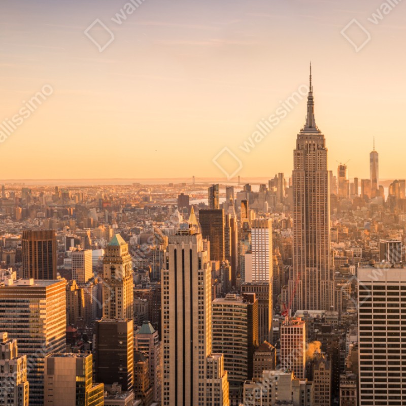 Repositionierbarer Aufkleber goldener sonnenuntergang über der skyline von New York – Wallnifity® Repositionierbarer Aufkleber goldener sonnenuntergang über der skyline von New York – Wallnifity®