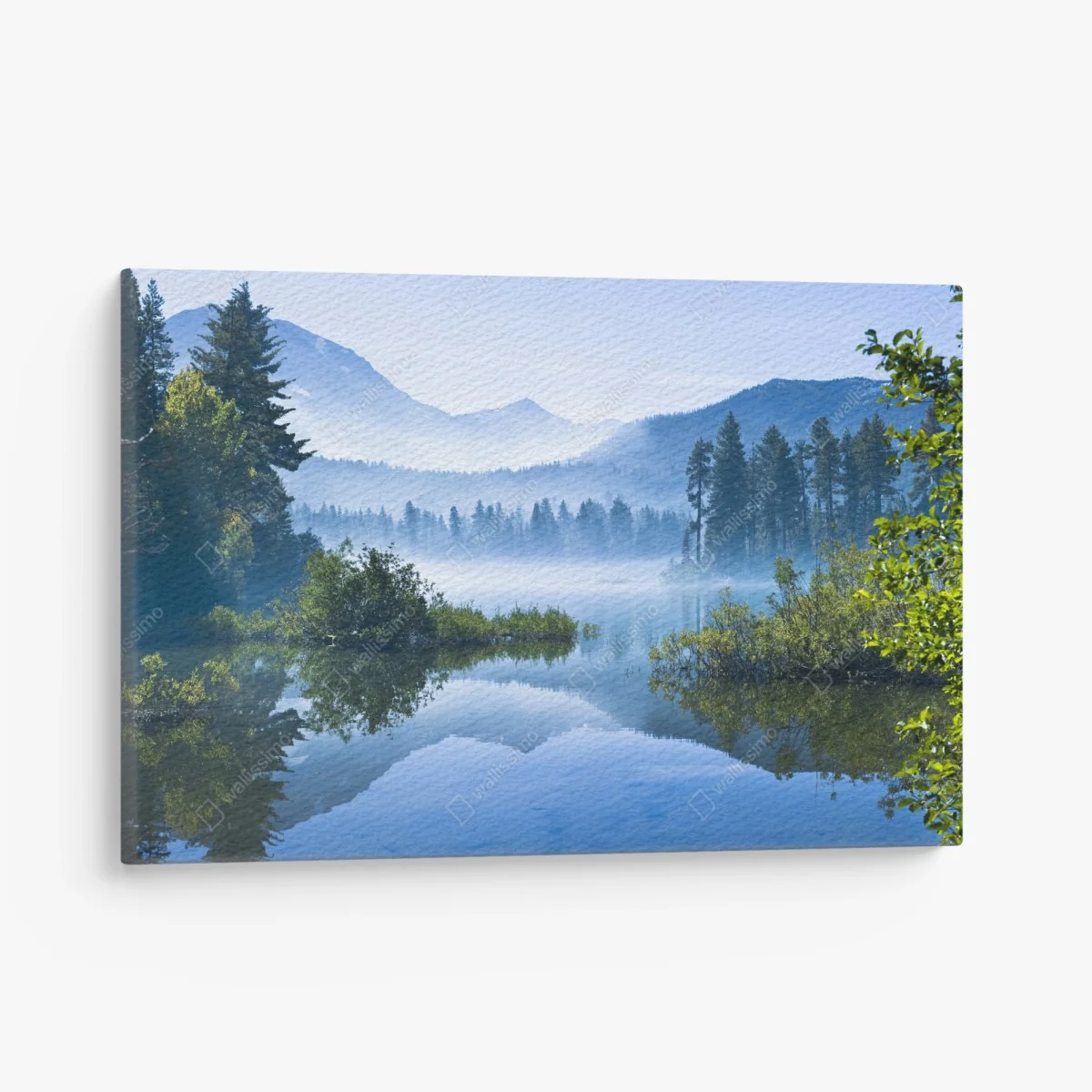 Leinwandbild nebliger bergsee mit spiegelnder oberfläche – Wallnifity® Leinwandbild nebliger bergsee mit spiegelnder oberfläche – Wallnifity®