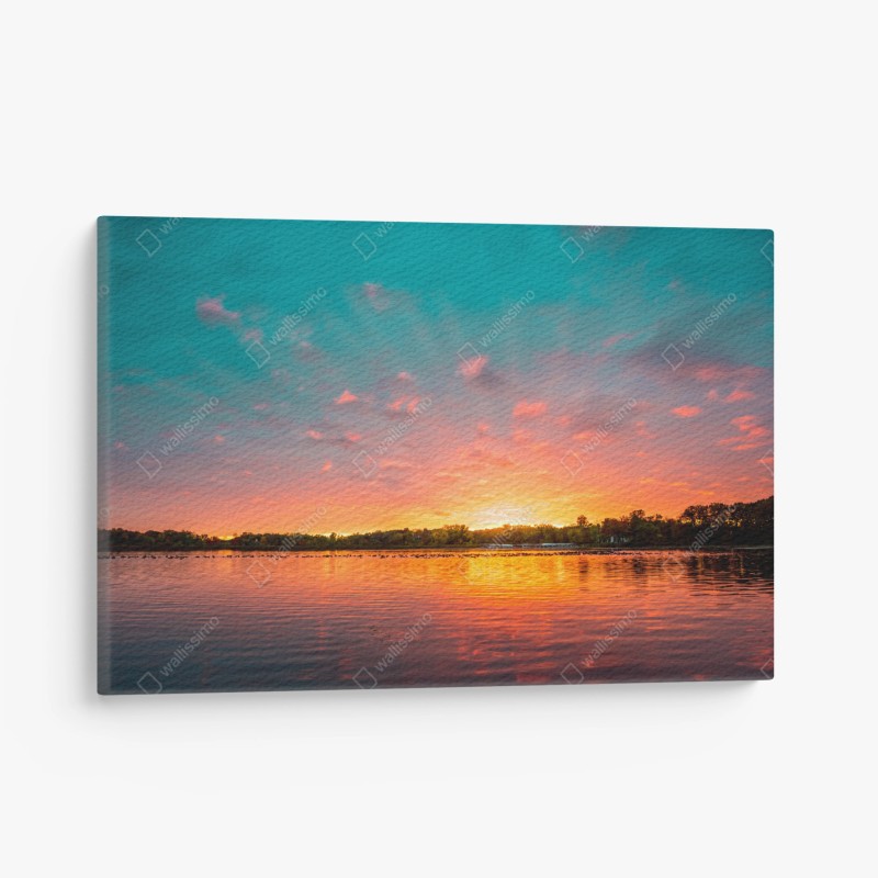 Leinwandbild türkisfarbener sonnenuntergang über ruhigem see