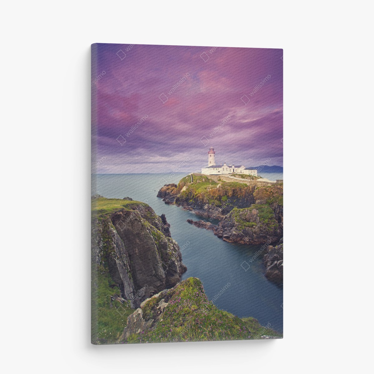 Leinwandbild lila leuchtturm an steiler küste – Wallnifity®