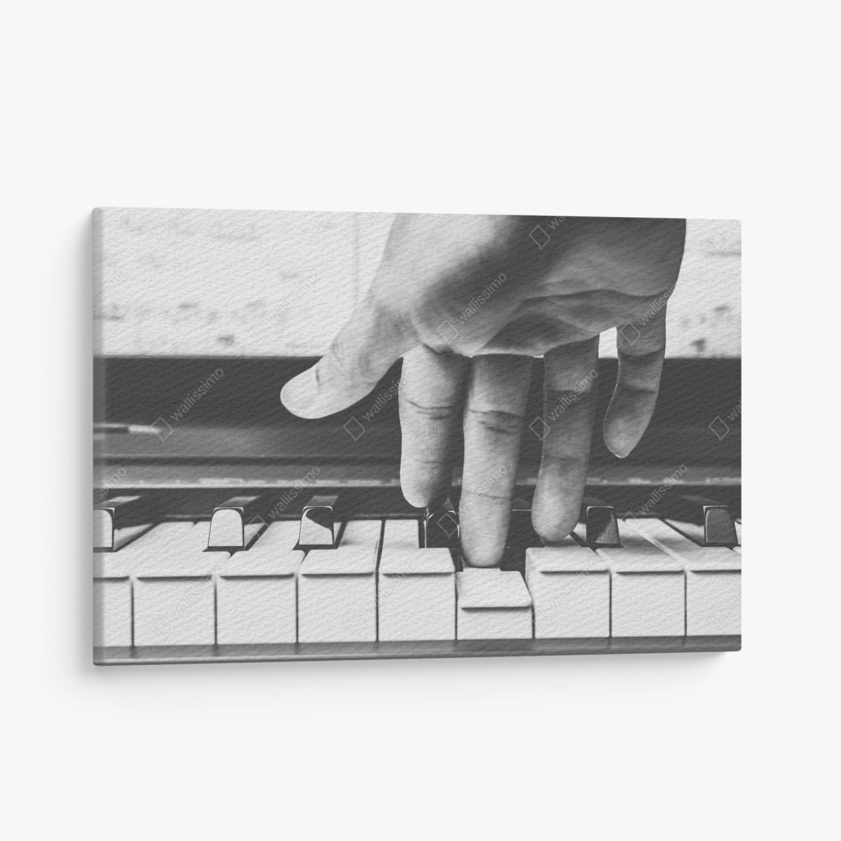 Leinwandbild hand auf klaviertasten – Wallnifity®