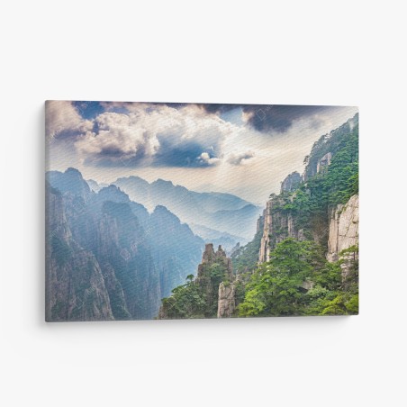 Leinwandbild neblige bergklippen mit sonnenstrahlen – Wallnifity®