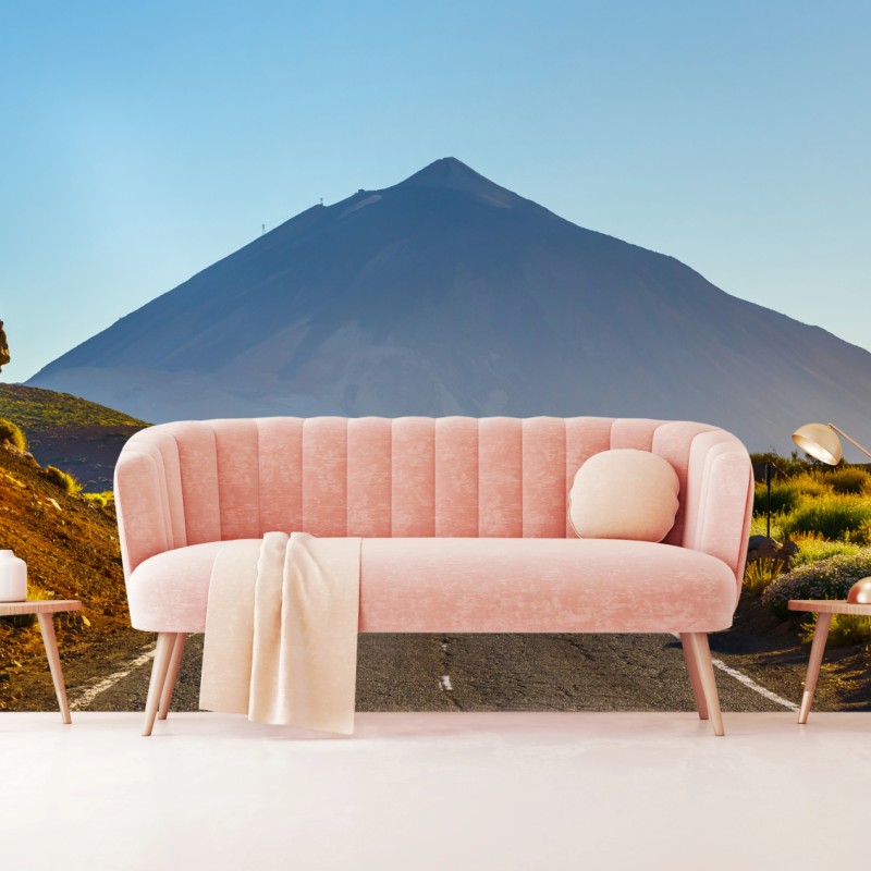 Fototapete sonnenbeschienene bergstraße zum vulkan