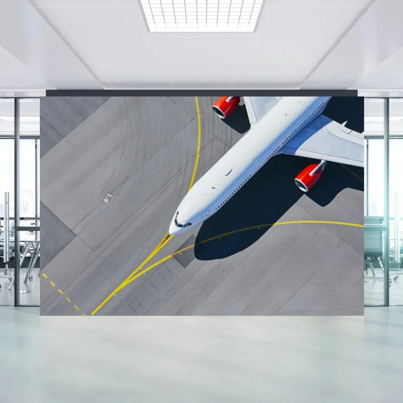 Fototapete luftaufnahme eines flugzeugs auf dem rollfeld