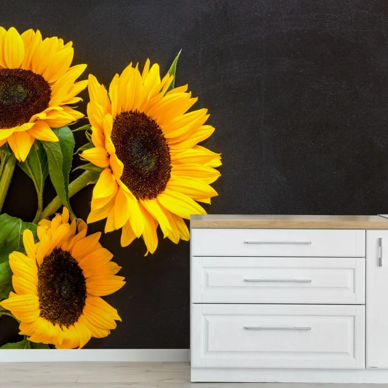 Fototapete sonnenblumenstrauß auf schwarzem hintergrund