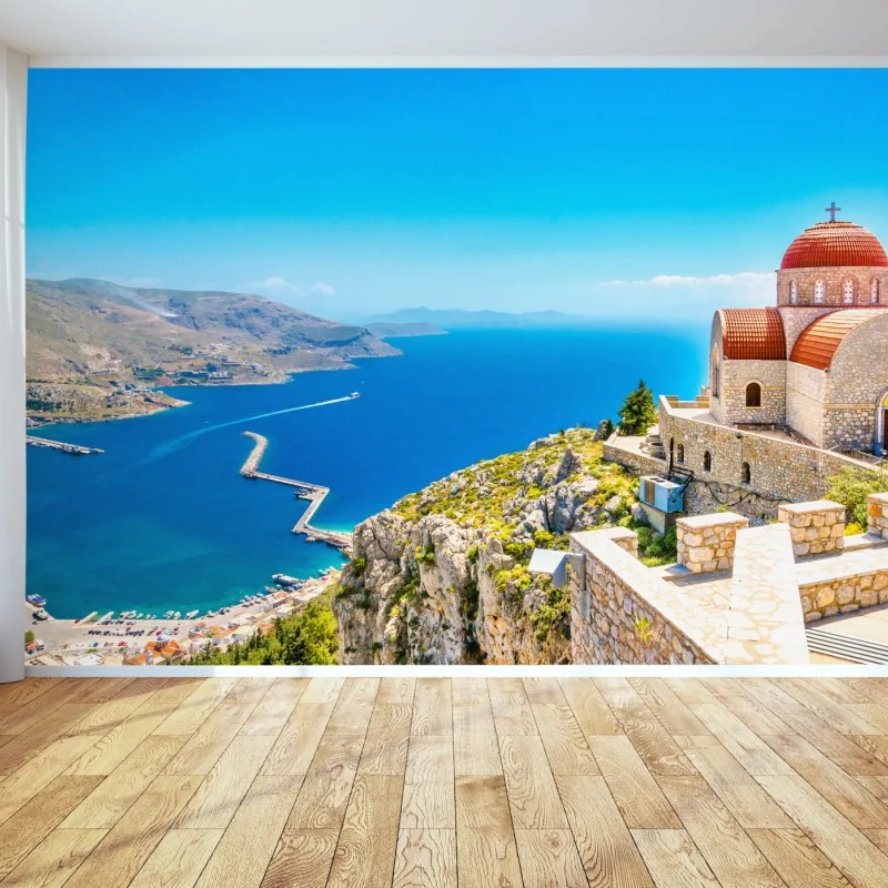 Fototapete griechische kirche auf klippe über dem meer