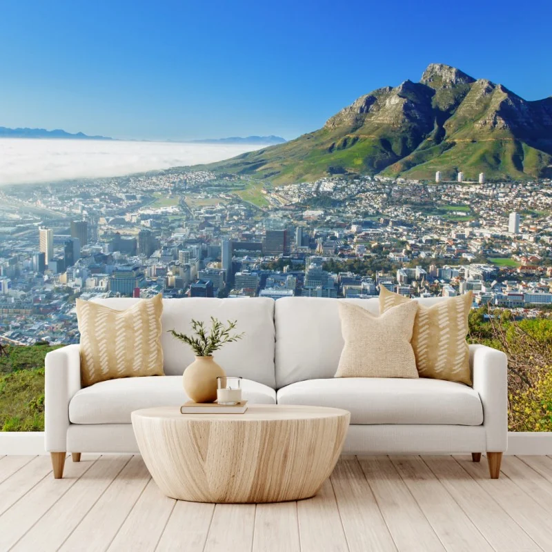 Fototapete stadtpanorama mit bergen und blauem himmel
