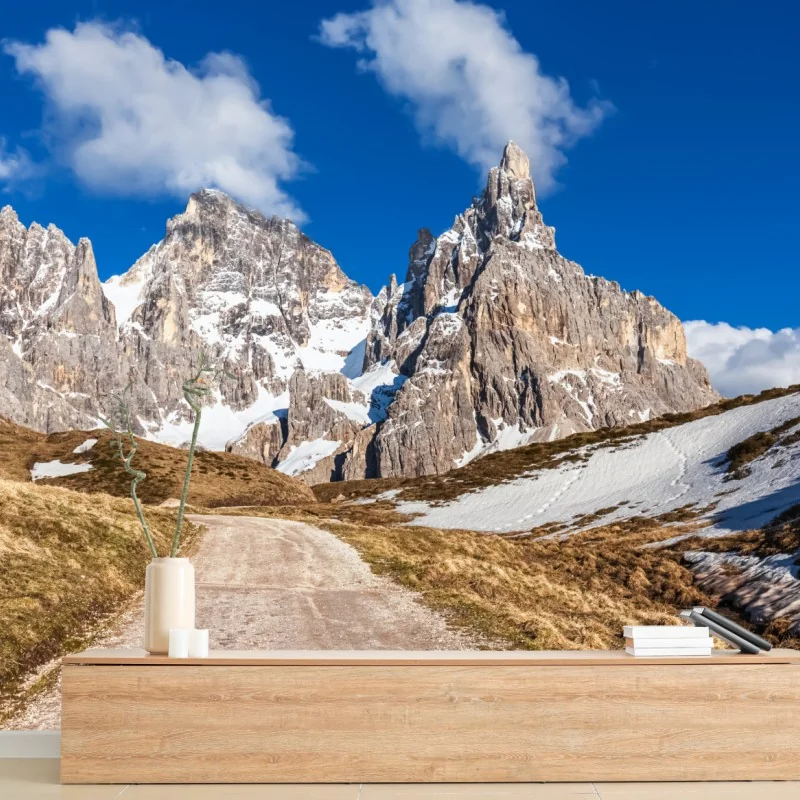 Fototapete hohe berggipfel und ein sich windender weg