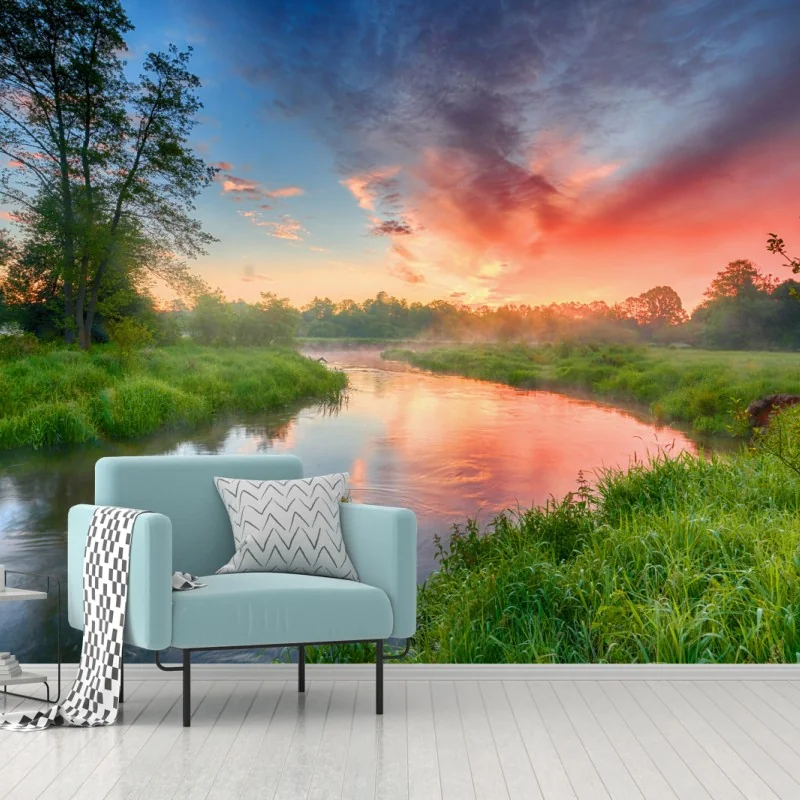 Fototapete sonnenaufgang über einem nebligen flussufer