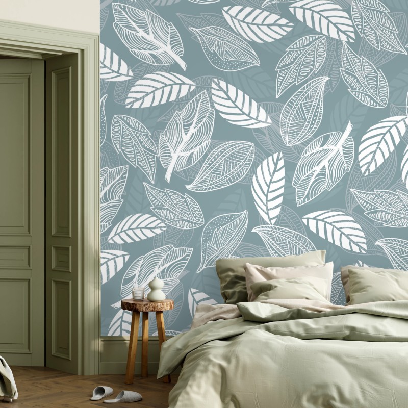 Fototapete handgezeichnetes blättermuster auf türkisfarbenem hintergrund