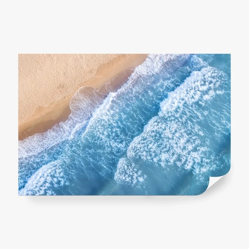 Fototapete luftaufnahme türkiser wellen an sandigem strand