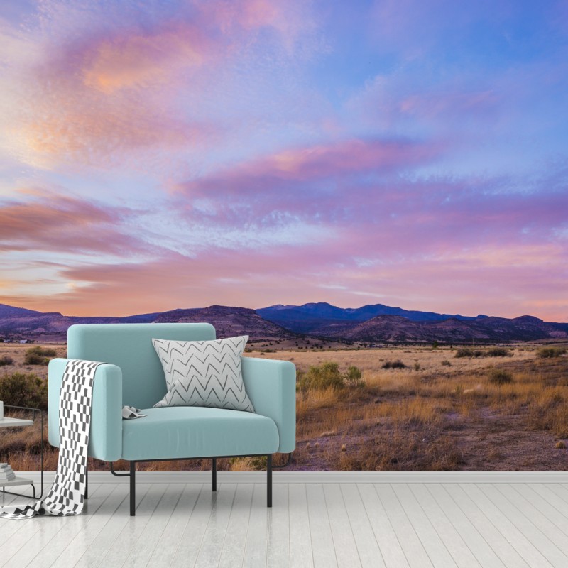 Fototapete pastellsonnenuntergang über wüstenbergen