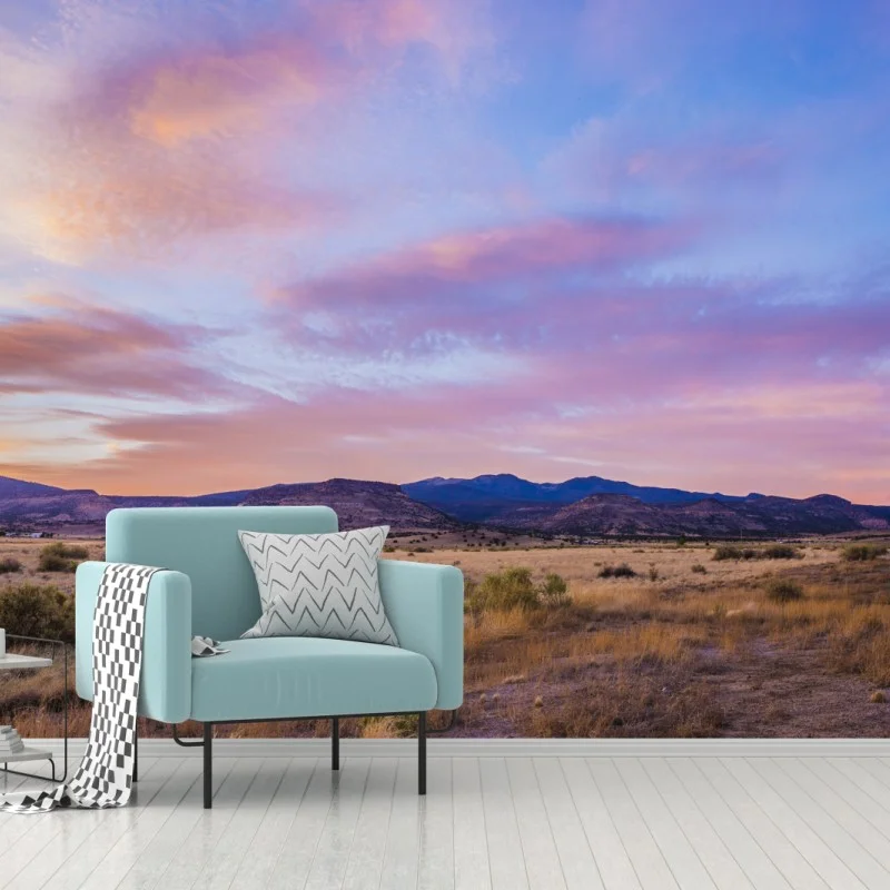 Fototapete pastellsonnenuntergang über wüstenbergen