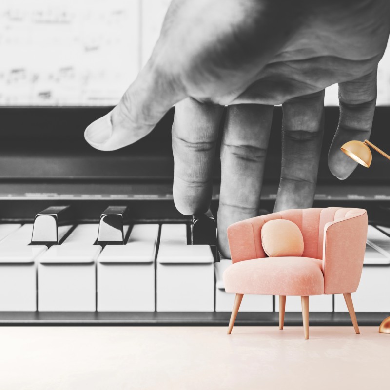 Fototapete hand auf klaviertasten