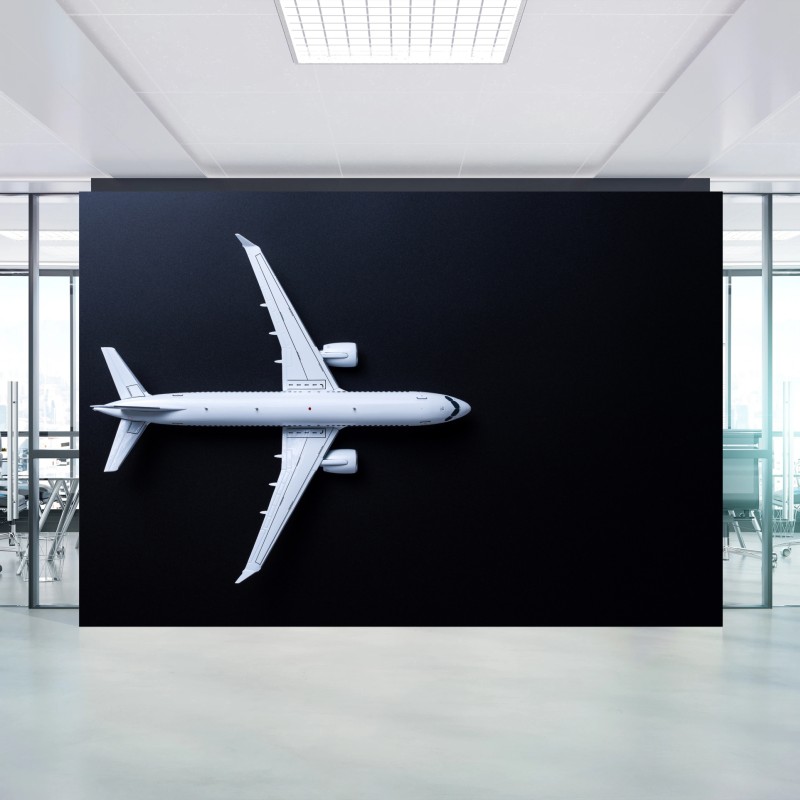 Fototapete weißes flugzeug von oben auf schwarzem hintergrund