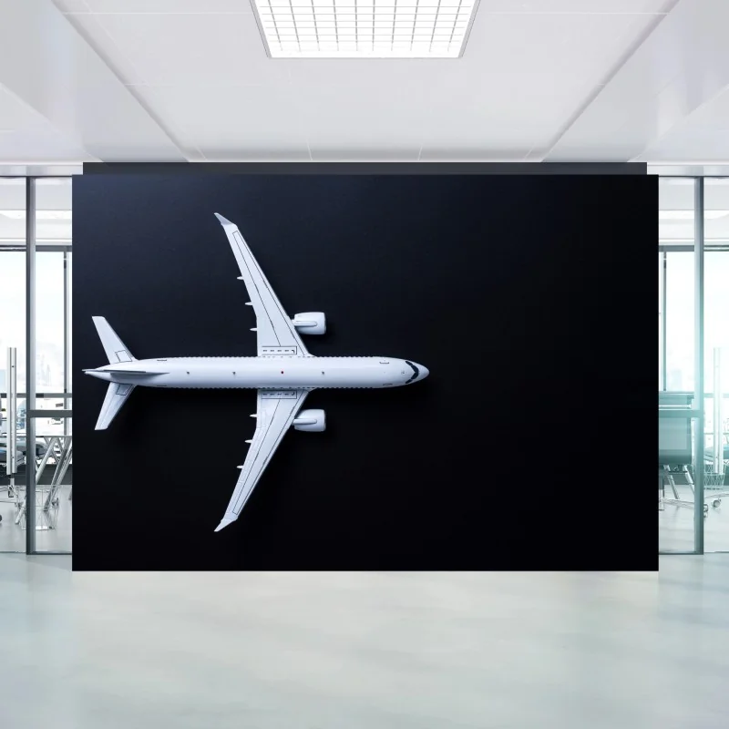 Fototapete weißes flugzeug von oben auf schwarzem hintergrund