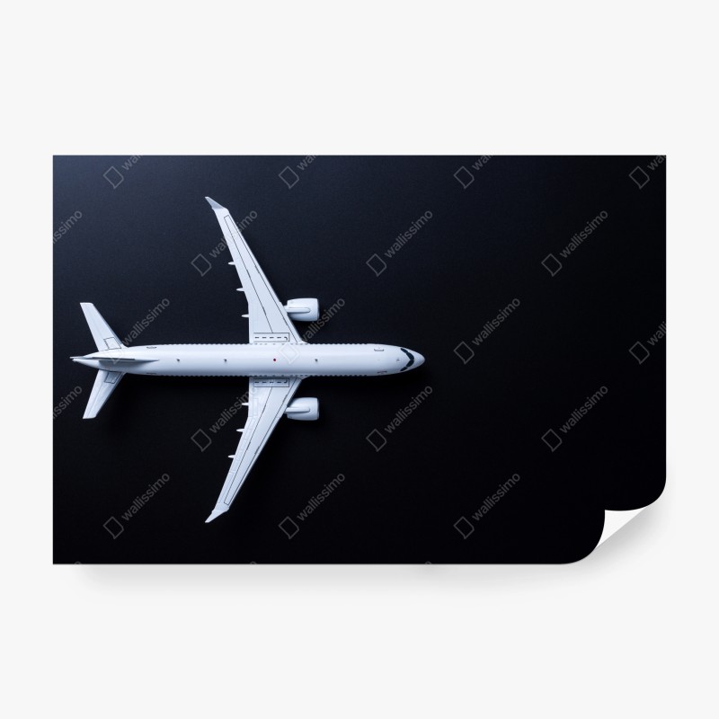 Fototapete weißes flugzeug von oben auf schwarzem hintergrund