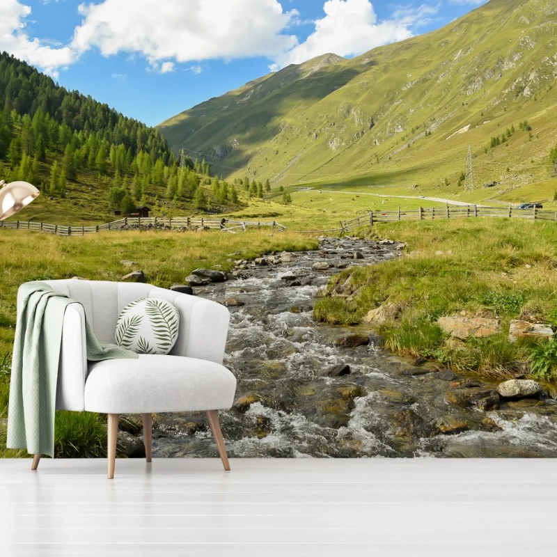 Fototapete alpenbach im sonnigen tal