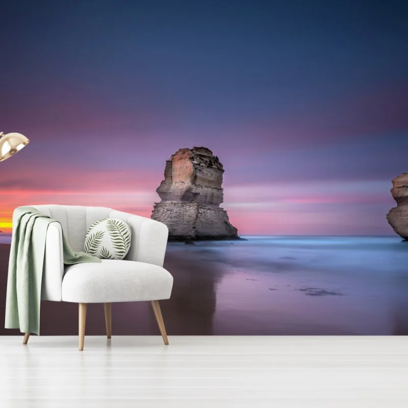Fototapete ruhige küstenlandschaft mit felsformationen bei sonnenuntergang