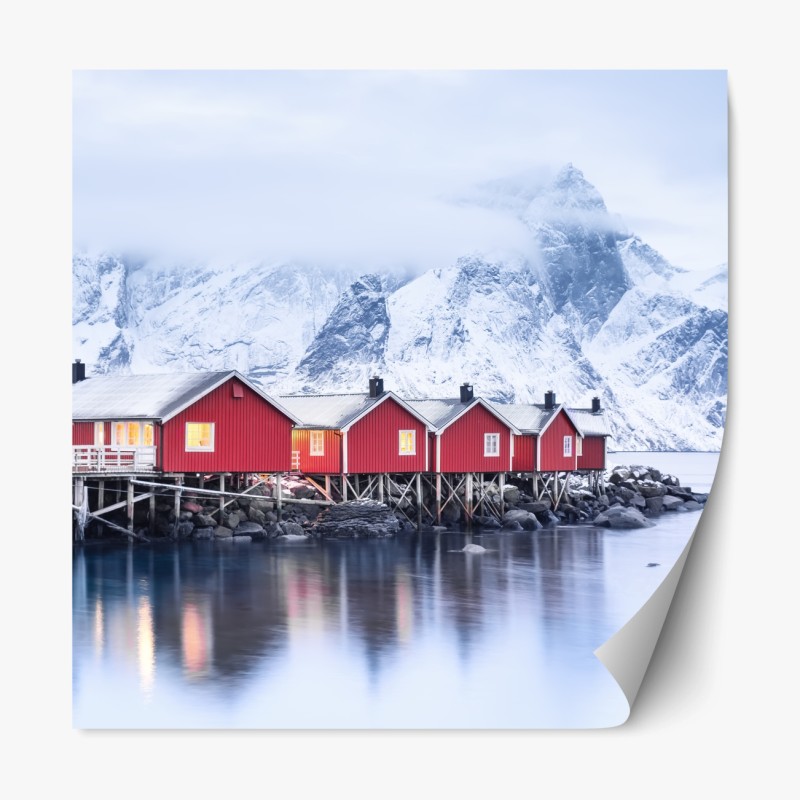 Repositionierbarer Aufkleber sonnenaufgang über den roten hütten der Lofoten