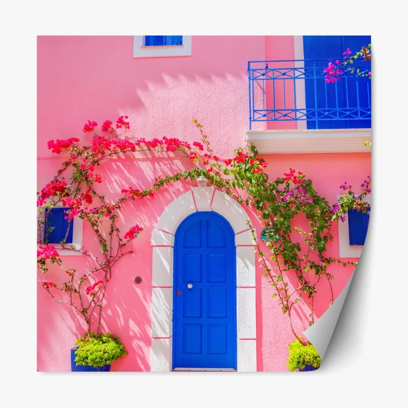 Repositionierbarer Aufkleber leuchtende rosa fassade mit blauer tür