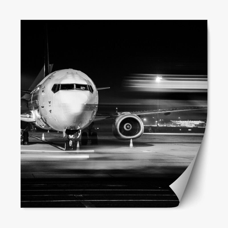 Repositionierbarer Aufkleber monochromes jet auf dem rollfeld bei nacht