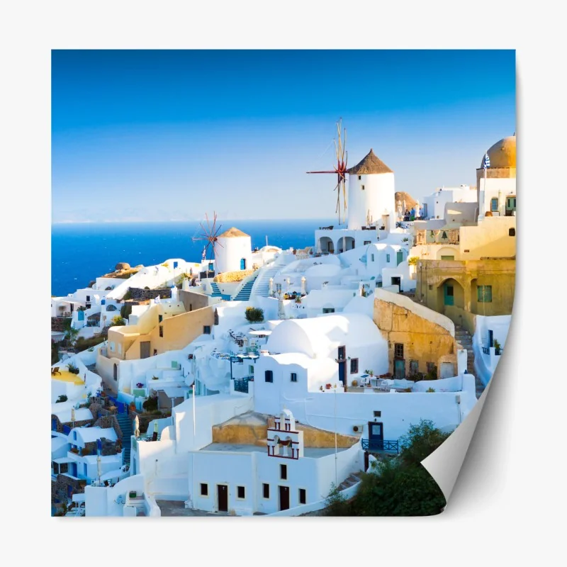 Repositionierbarer Aufkleber sonnenbeschienenes Santorini-dorf am meer