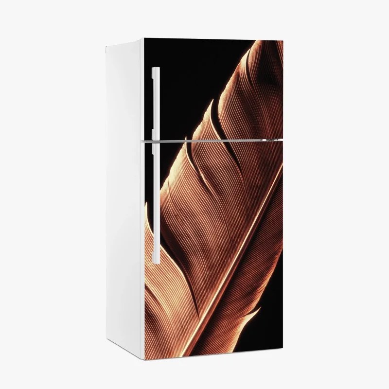 Kühlschrankaufkleber goldene feder makro vor schwarzem hintergrund