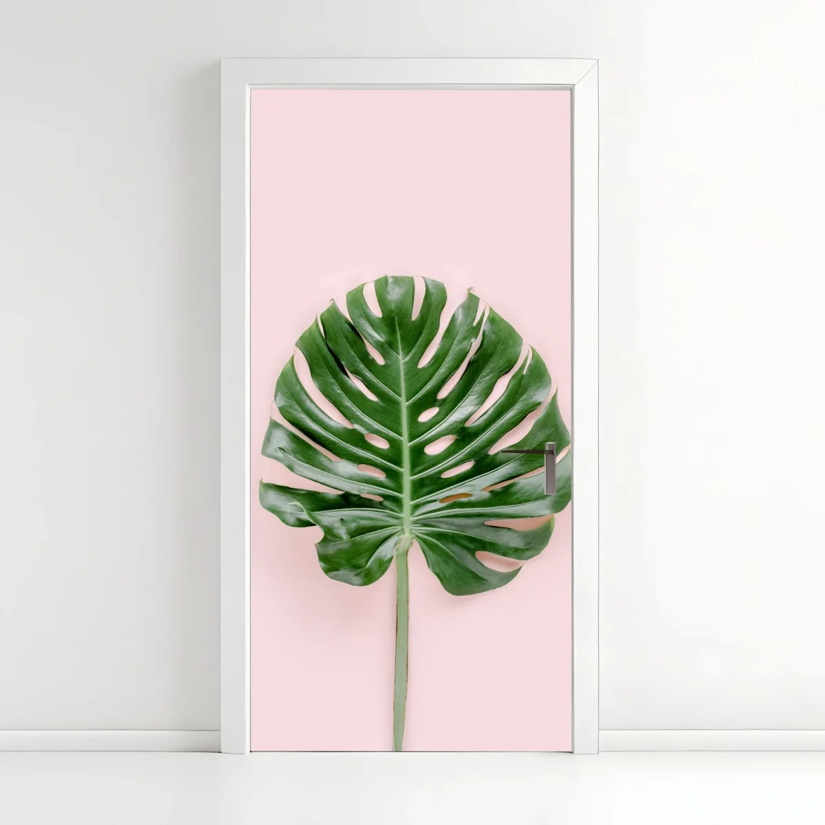 Türaufkleber monstera-blatt auf pastell-rosa hintergrund – Wallnifity® Türaufkleber monstera-blatt auf pastell-rosa hintergrund – Wallnifity®
