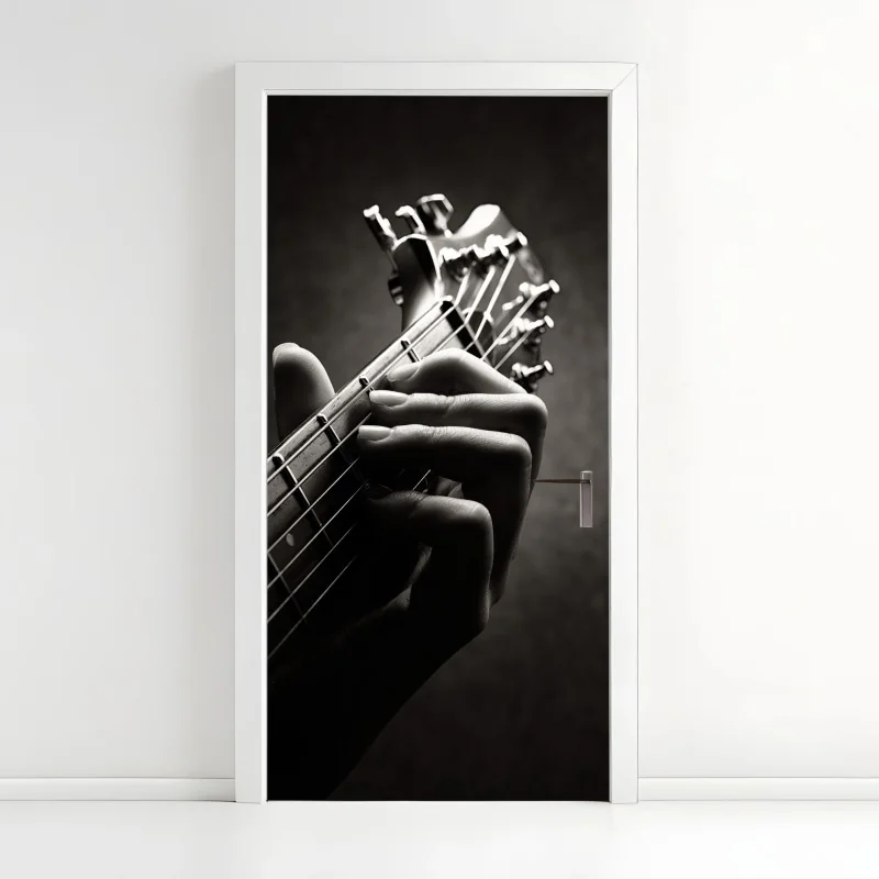 Türaufkleber nahaufnahme der hand auf dem griffbrett