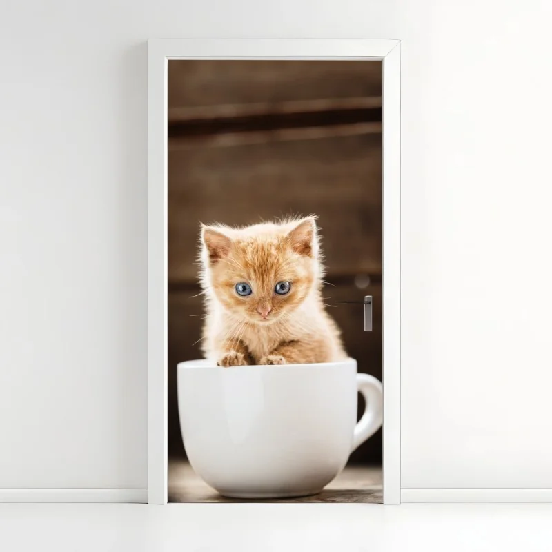 Türaufkleber rötliches kätzchen in einer teetasse