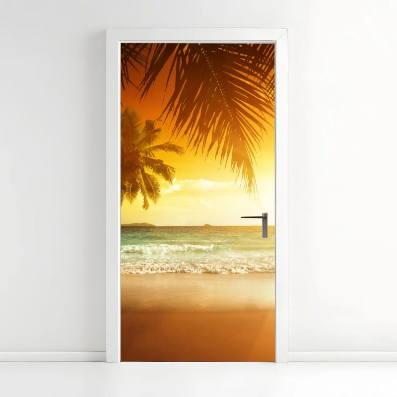 Türaufkleber goldener sonnenuntergang an einem strand in der Karibik