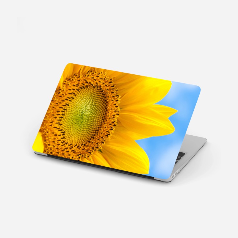 Laptop-Aufkleber leuchtende sonnenblume vor blauem himmel