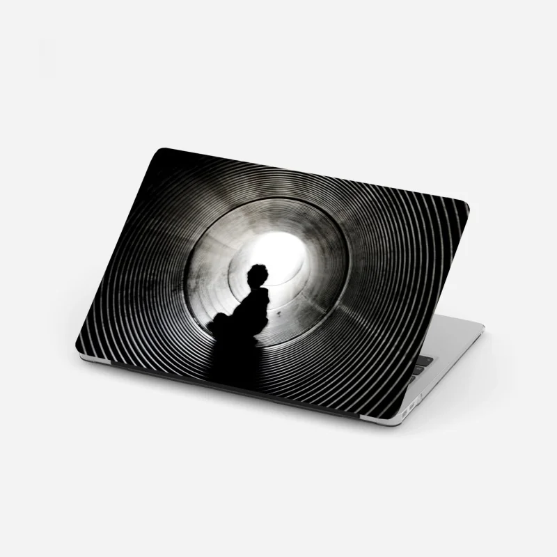Laptop-Aufkleber silhouette in einem spiraltunnel