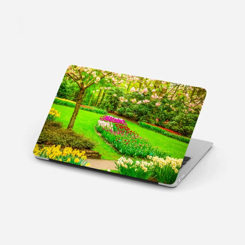 Laptop-Aufkleber frühlingsgarten in blüte: tulpen und kirschblüten