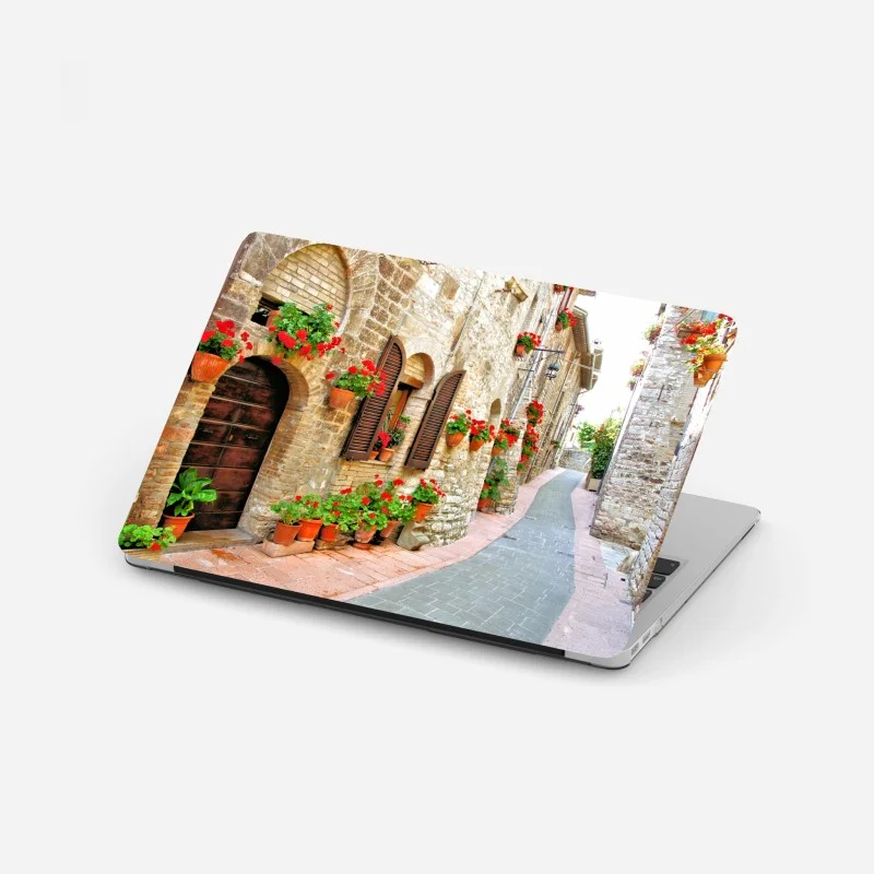 Laptop-Aufkleber sonnige steingasse mit roten geranien