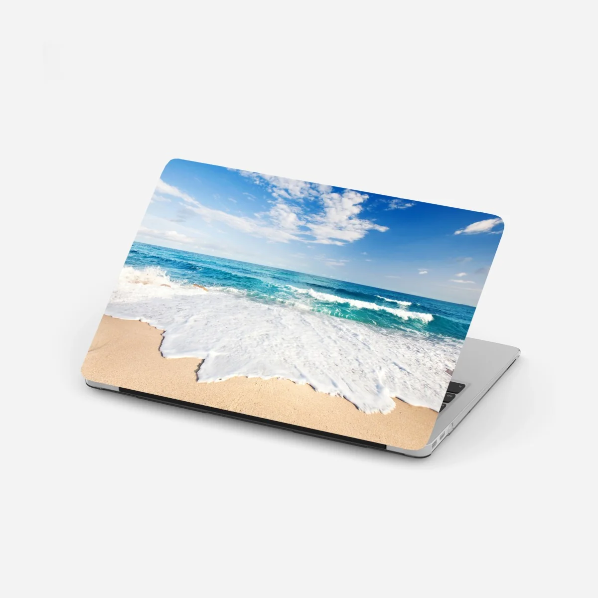 Laptop-Aufkleber türkisfarbene wellen am sandstrand – Wallnifity®