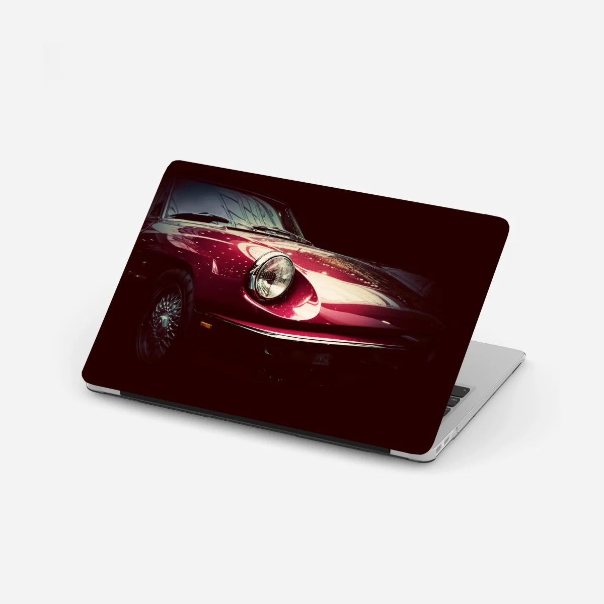 Laptop-Aufkleber nahaufnahme eines klassischen roten sportwagens – Wallnifity® Laptop-Aufkleber nahaufnahme eines klassischen roten sportwagens – Wallnifity®