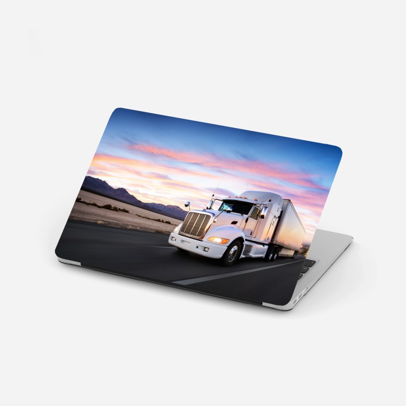 Laptop-Aufkleber majestätischer elefant im sonnenlichtdurchfluteten wald – Wallnifity®