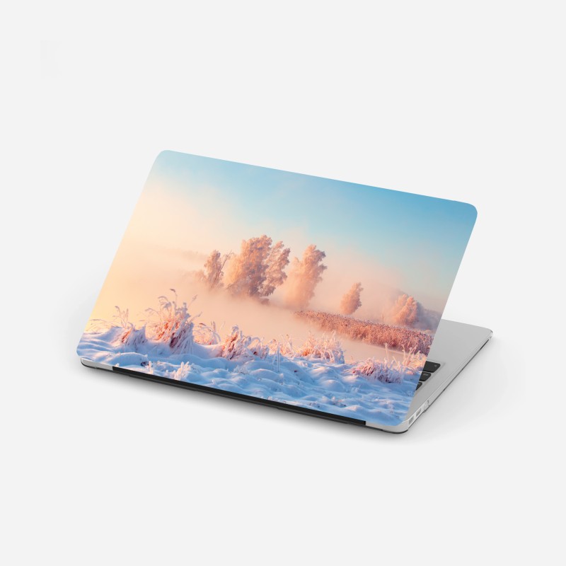Laptop-Aufkleber winterlicher sonnenaufgang über einer frostigen wiese