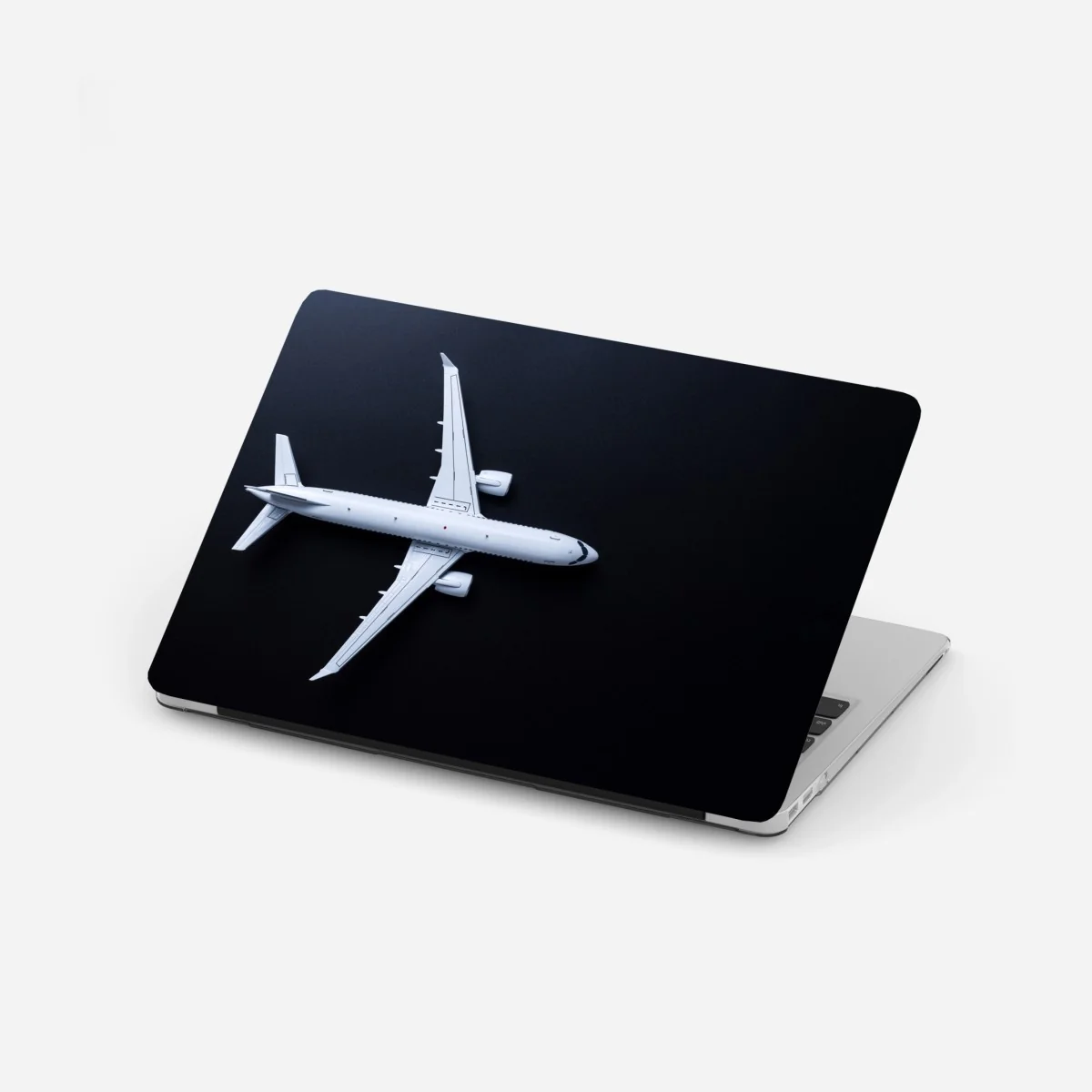 Laptop-Aufkleber weißes flugzeug von oben auf schwarzem hintergrund – Wallnifity® Laptop-Aufkleber weißes flugzeug von oben auf schwarzem hintergrund – Wallnifity®