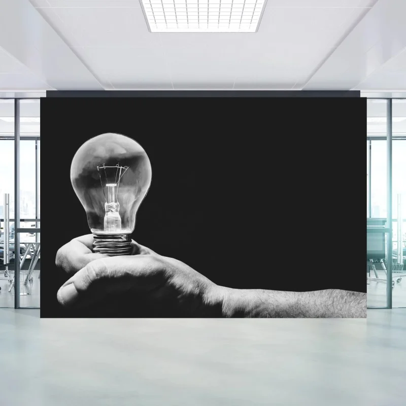 Fototapete monochrome hand hält glühbirne – Wallnifity®