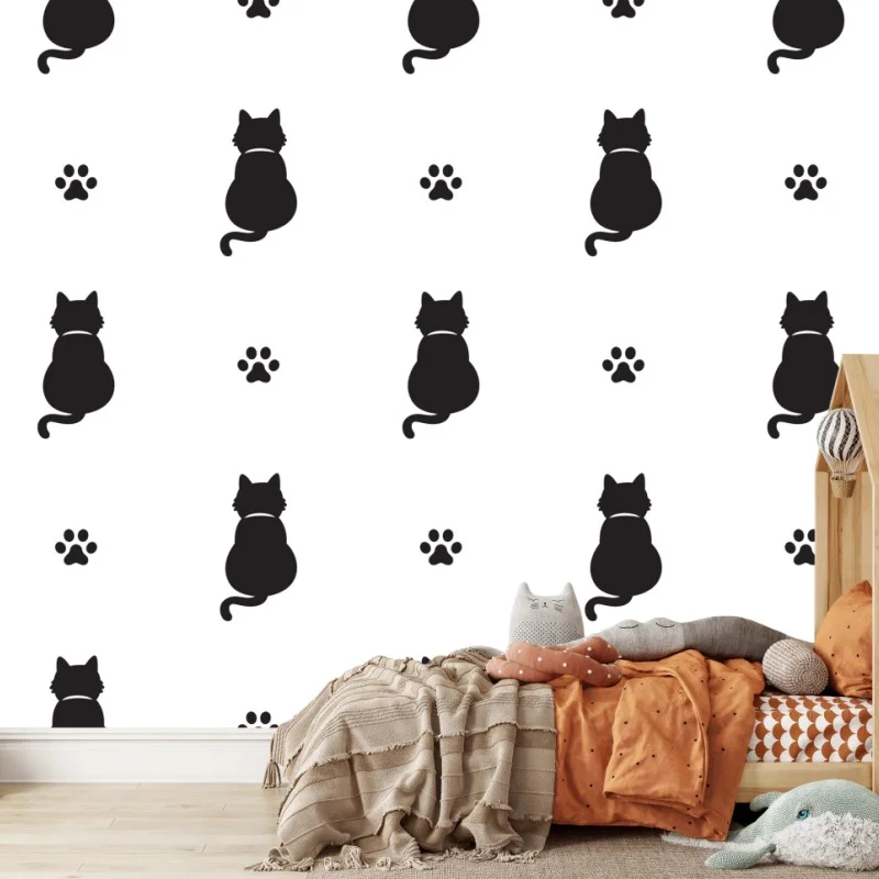 Fototapete muster mit schwarzen katzensilhouetten