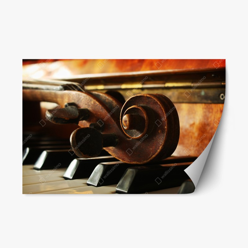 Repositionierbarer Aufkleber vintage geigenkopf auf klaviertasten