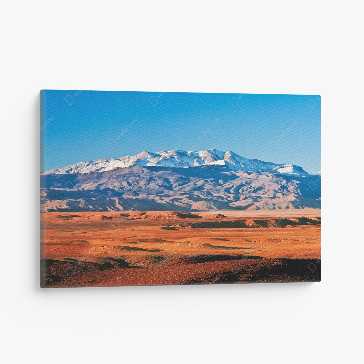 Leinwandbild sonnenbeschienene wüste mit schneebedeckten bergen – Wallnifity®