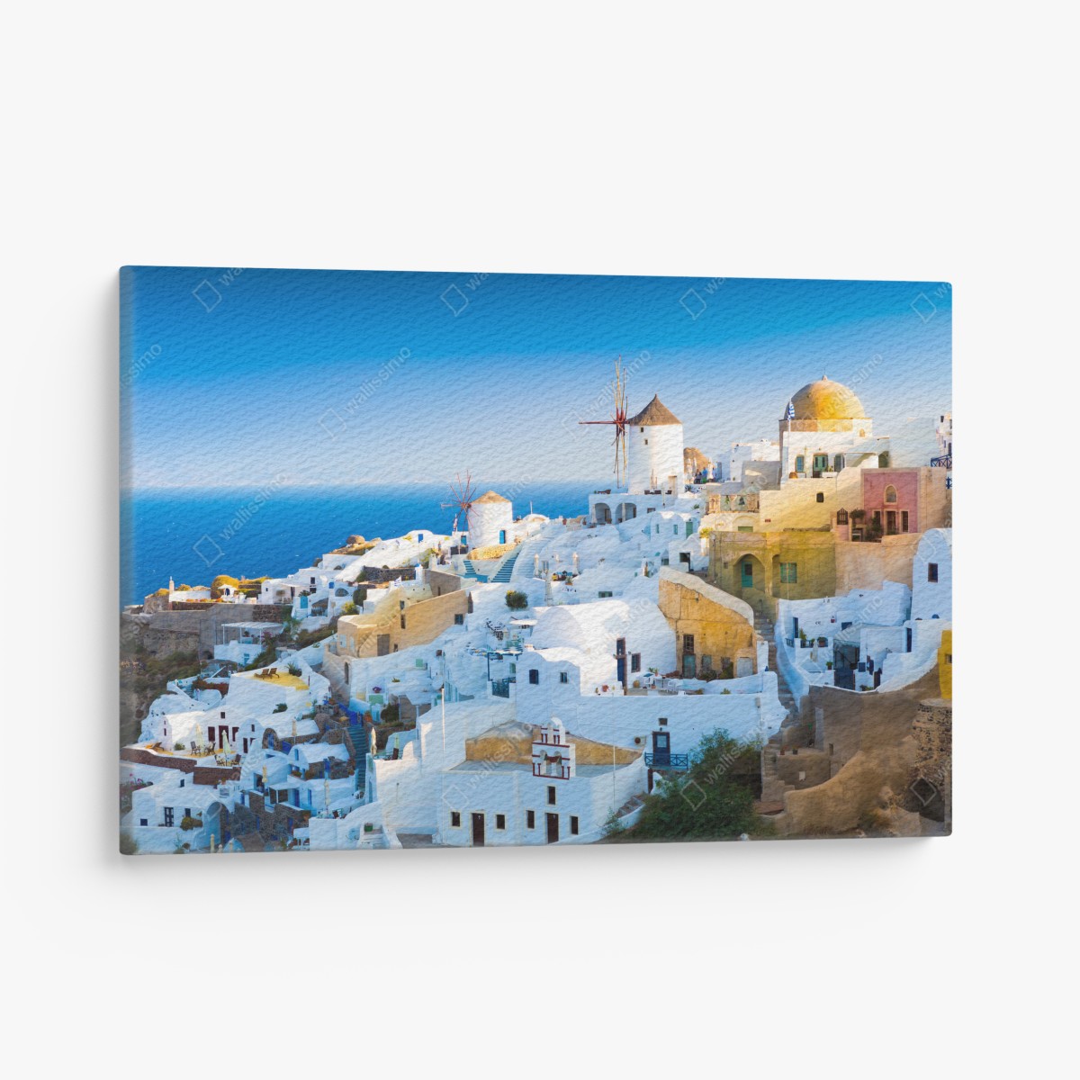 Leinwandbild sonnenbeschienenes Santorini-dorf am meer – Wallnifity®