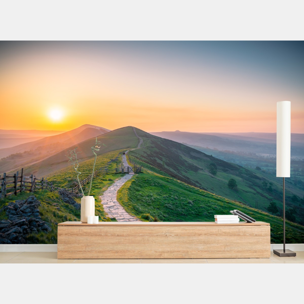 Fototapete sonnenaufgang über grünen hügeln mit steinweg – Wallnifity®