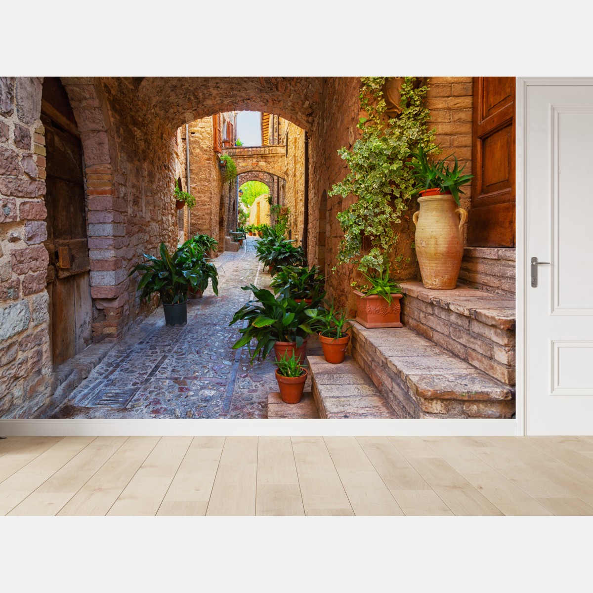 Fototapete sonnige gasse mit blumentöpfen in Spello – Wallnifity®